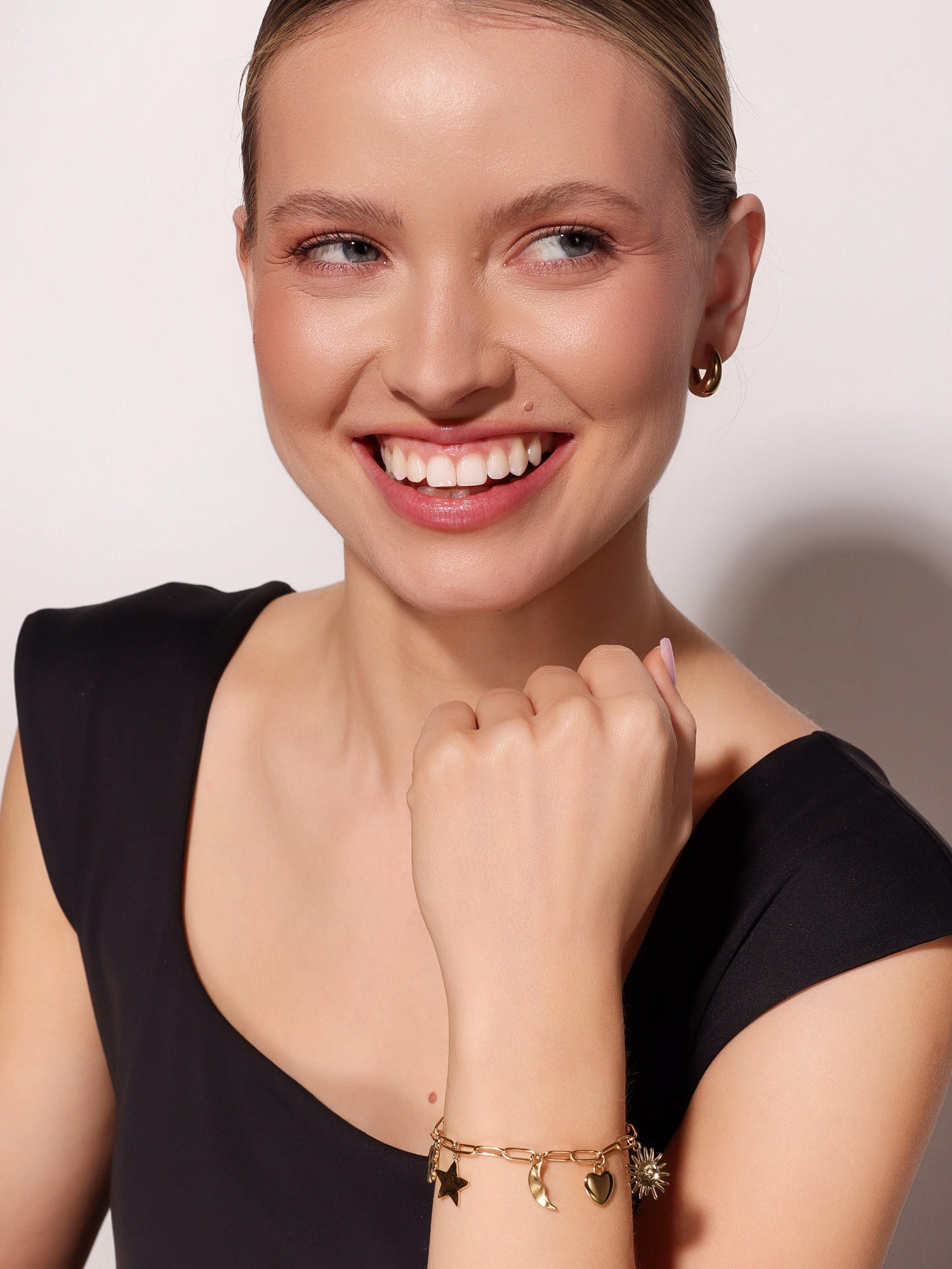 BRANSOLETKA Z ZAWIESZKAMI ASTRALNYMI pozłacana